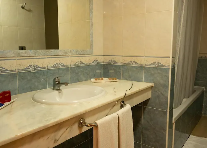 Grand Muthu Golf Plaza & Отель Сан Мигель